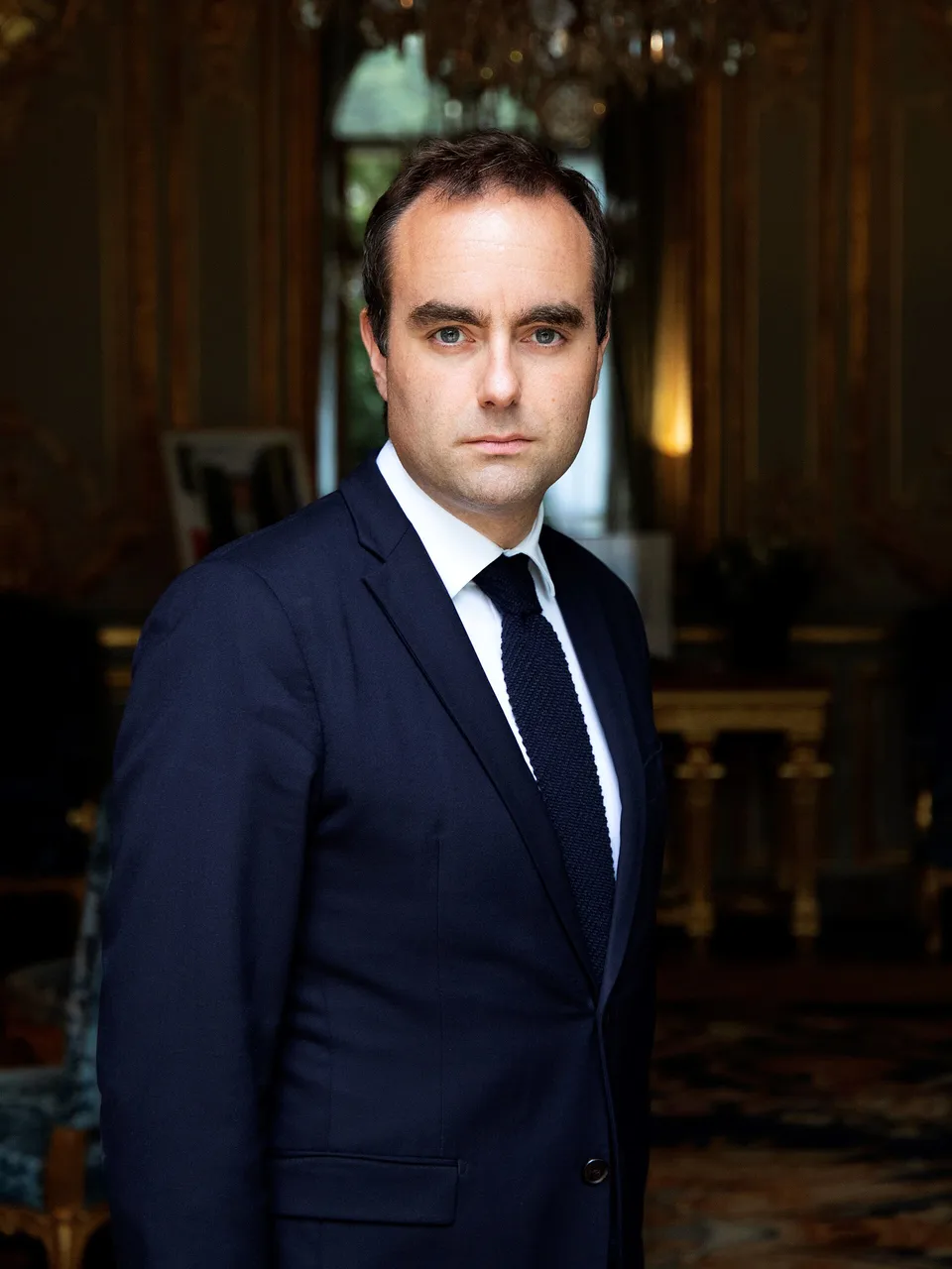 Official portrait of Sébastien Lecornu wearing a dark suit.