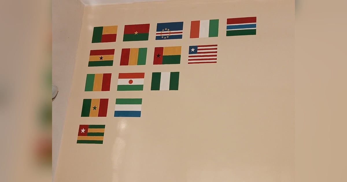 A row of national flags of West African countries that are members of ECOWAS